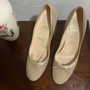 Christian Louboutin tan and gold heels.